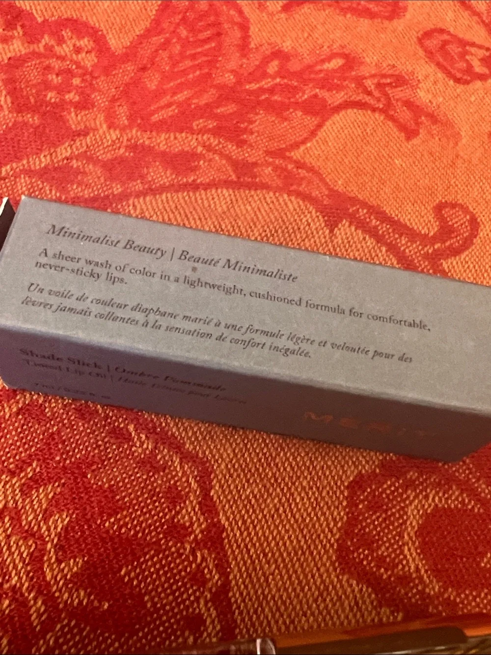 Merit- shade stick- Tinted Lip Oil in taupe